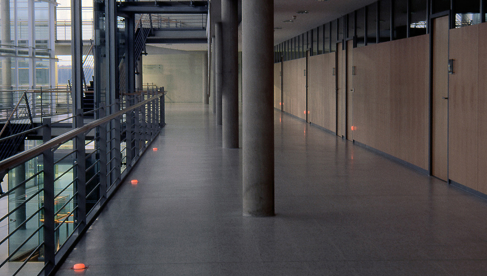 Art, artwork. An installation entitled "Retrospective (Plugged-Light)" by Nika Span / Nika Špan. Material: Plug-in night-lights with a diameter of 7 cm, adhesive foil. Exhibitions: „...Durchschnittlich in Tagen...“, Kreishaus, Gütersloh, Germany Zero Gravity, Salon 3, London; Cornerhouse, Manchester, United Kingdom